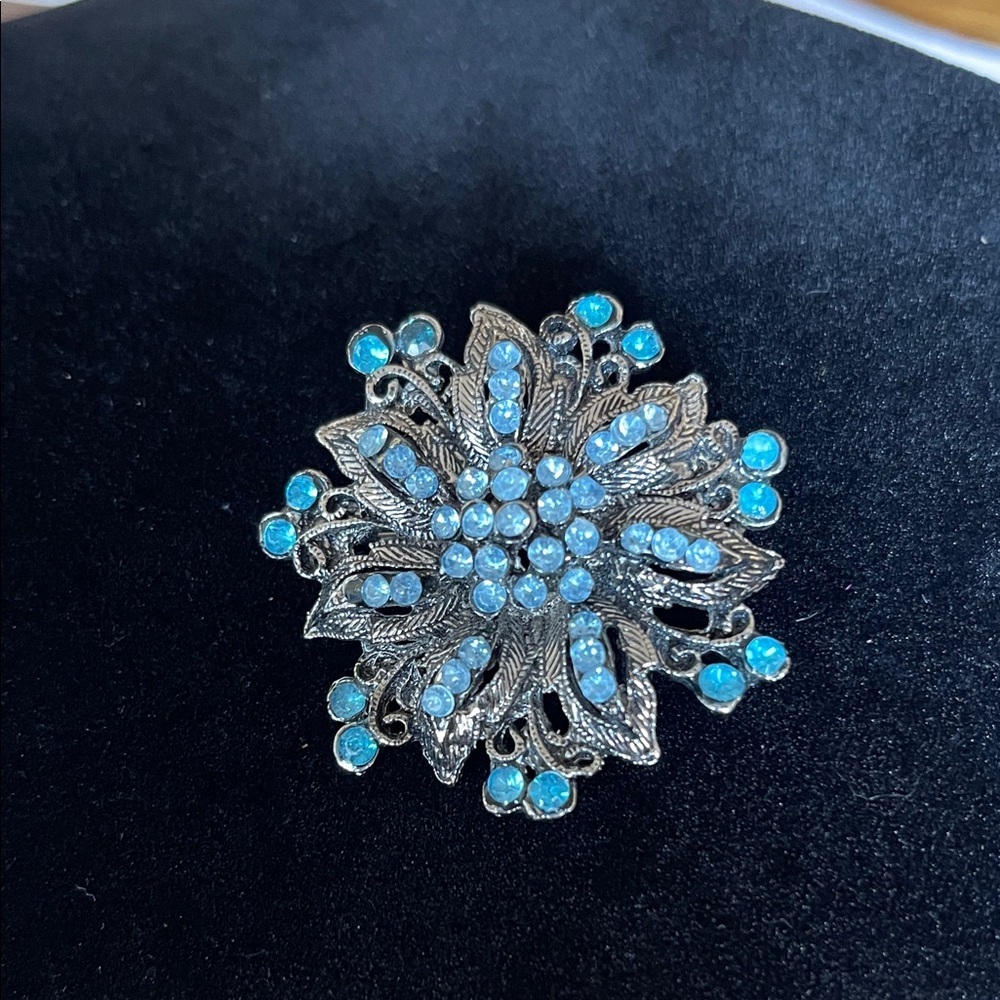 Elegant Silver and Blue Floral Brooch